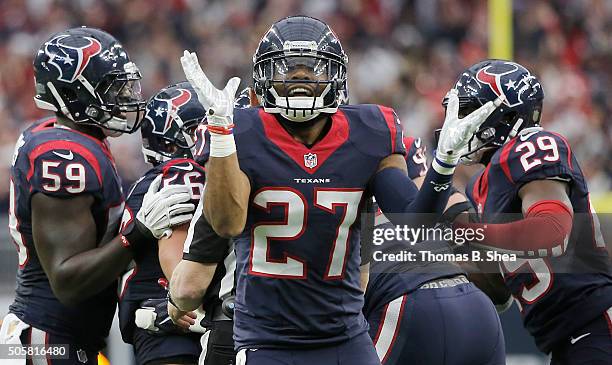 Quintin Demps of the Houston Texans celebrates Kansas City Chiefs turnover during the AFC Wild Card Playoff game at NRG Stadium on January 9, 2016 in...