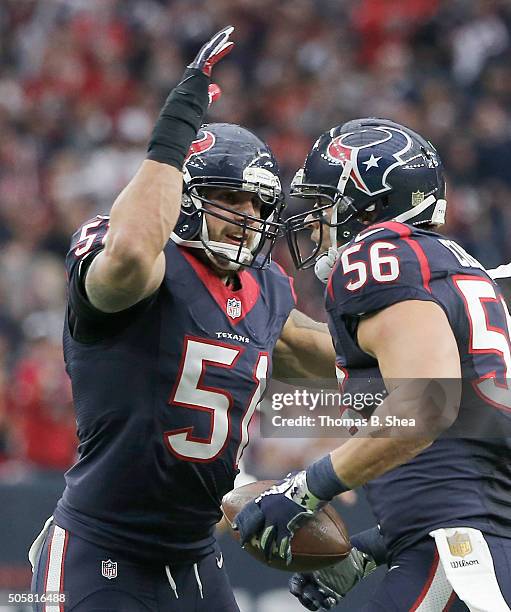 Brian Cushing of the Houston Texans reacts after intercepting the ball from the Kansas City Chiefs during the AFC Wild Card Playoff game at NRG...