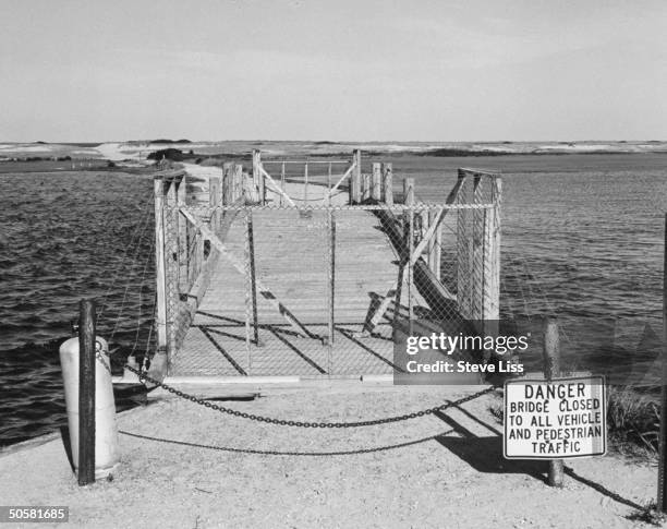 The now fenced-off Dike Bridge w. Danger Bridge Closed... Sign in front of it; Mary Jo Kopechne drowned in the car that Sen. Ted Kennedy drove off...
