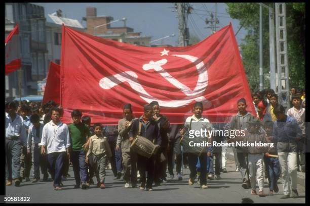 Pro-democracy protestors w. Communist Party banner & Cong. Party flag marching after lifting of ban on multi-party politics.