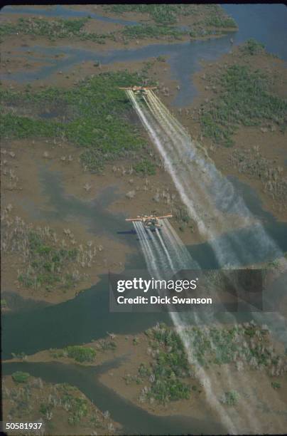 Planes flying over delta area to spray defoliant Agent Orange. 20 mi. SE of Saigon