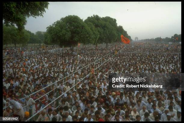 Huge crowd attending Bharatiya Janata Party anti-Pakistan, pro-India rally replete w. Hindu nationalist BJP flag.