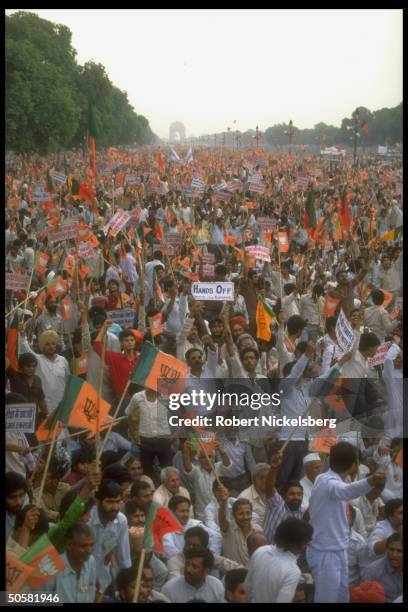 Crowd during Bharatiya Janata Party anti-Pakistan, pro-India rally replete w. Hindu nationalist BJP flags & hands off Pakistan fr. Kashmir signs.