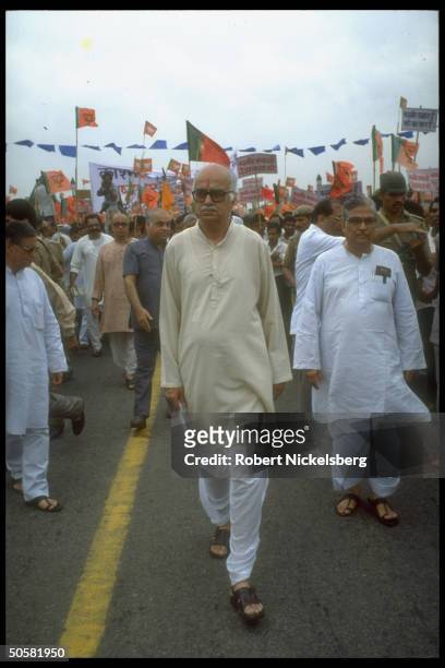 Bharatiya Janata Party ldr. L.K. Advani w. Followers of Hindu nationalist BJP during anti-Pakistan, pro-India rally.