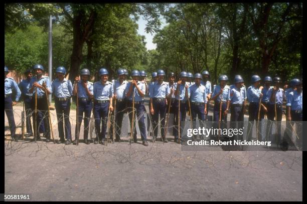 Riot police at ready during Jamaat-e-Islami Party anti-Indian, pro-Kashmiri independence rally.