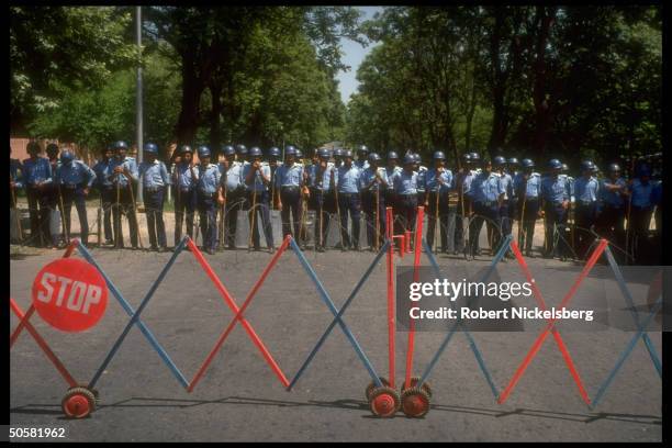 Riot police at ready during Jamaat-e-Islami Party anti-Indian, pro-Kashmiri independence rally.