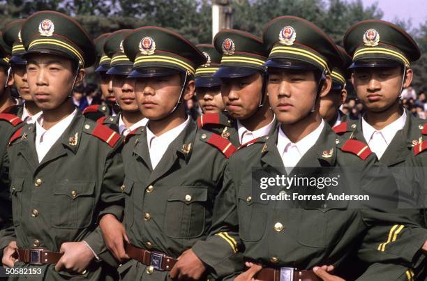 Chinese police, some seated and some standing with linked arms, block a student-led, pro-democracy march, Beijing, China, April 27, 1989.