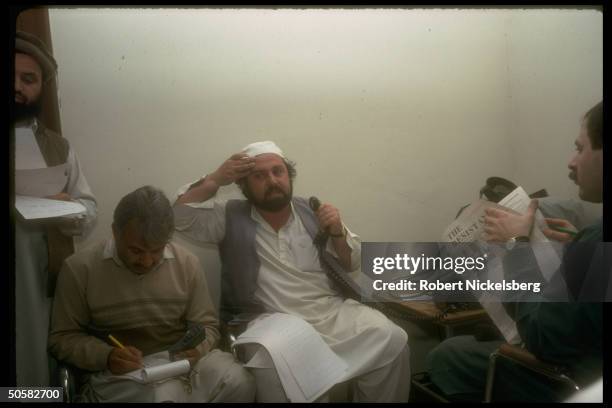 Mujahedin holding press conf. Via wireless w. Afghan Def. Min. Gen. Tanai after his failed coup attempt against Najibullah govt.