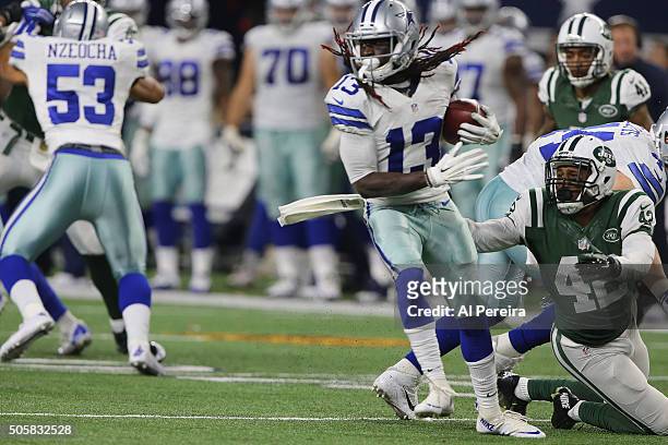 Wide Receiver Lucky Whitehead of the Dallas Cowboys has a long gain against the New York Jets on December 19, 2015 at AT&T Stadium in Arlington,...