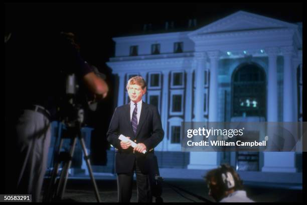 Anchorman Ted Koppel broadcasting live for NBC Nightly News, in front of Parliament bldg.