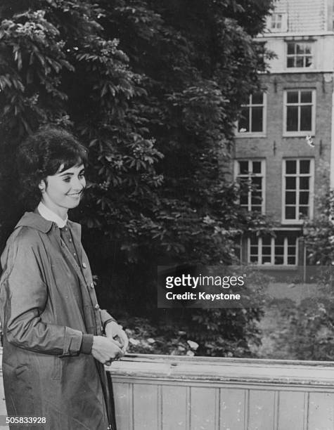 Actress Millie Perkins, who played the title role in the film 'The Diary of Anne Frank', pictured outside 'Het Achterhuis', the house where Anne...
