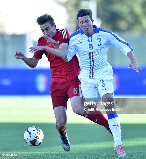 Oriolo Busquets Mas of Spain and Luca Pellegrini of Italy in action during the international friendly match between Italy U17 and Spain U17 on...