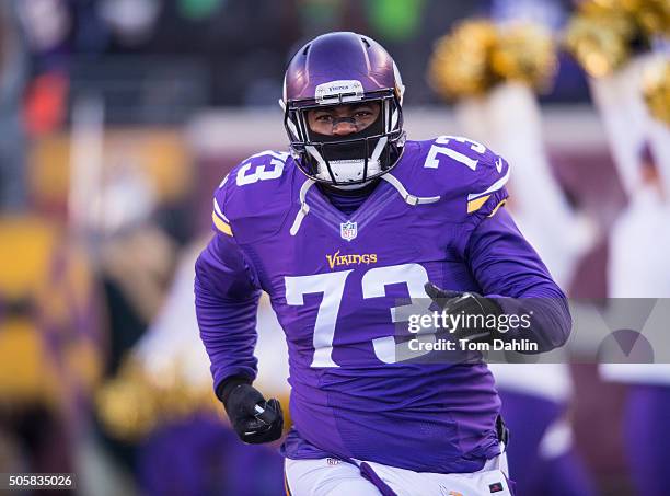 Sharrif Floyd of the Minnesota Vikings runs onto the field during an NFL game against the Seattle Seahawks at TCF Bank Stadium January 10, 2016 in...