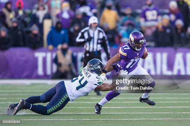 Jarius Wright of the Minnesota Vikings carries the ball during an NFL game against the Seattle Seahawks at TCF Bank Stadium January 10, 2016 in...