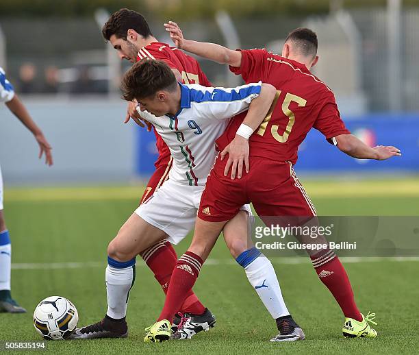Andrea Pinamonti of Italy and Mikel Carro Fandino of Spain in action during the international friendly match between Italy U17 and Spain U17 on...