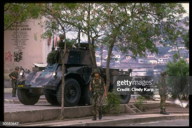 Troops on patrol during surge of anti-Americanism after US kidnapping of drug king Juan Ramon Matta Ballesteros to stand trial in US.