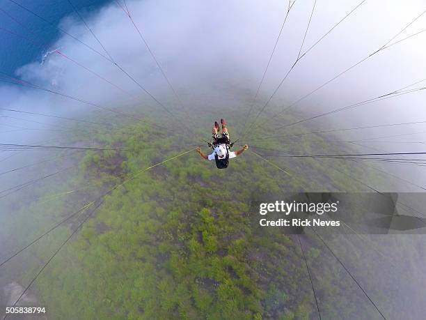 paraglider point of view - water glide stock pictures, royalty-free photos & images