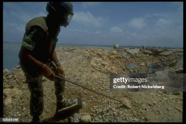 Minesweeping soldier as Colombo govt. Forces battle Liberation Tigers of Tamil Eelam rebels for control of besieged Jaffna Fort.