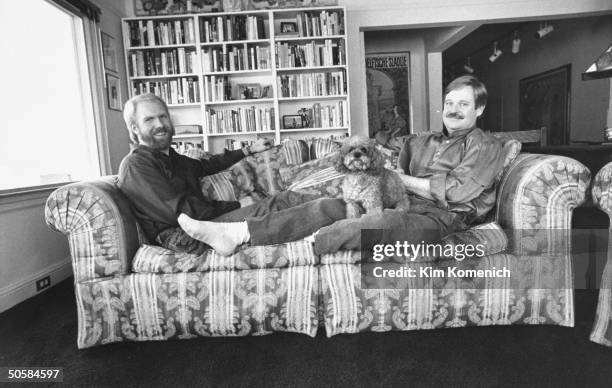 Gay writer Armistead Maupin relaxing w. Lover Terry Anderson , HIV-positive whose AIDS is under control w. AZT, w. Their dog, Willie.