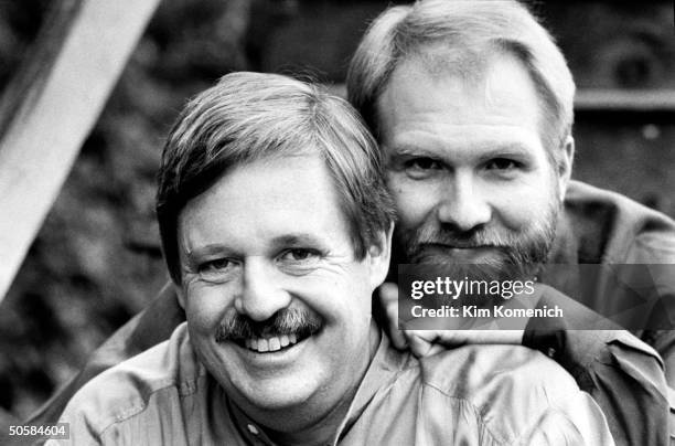 Gay writer Armistead Maupin posing w. Lover Terry Anderson who tests HIV-positive & is on AZT.