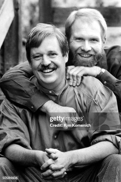 Gay writer Armistead Maupin posing w. Lover Terry Anderson who tests HIV-positive & is on AZT.