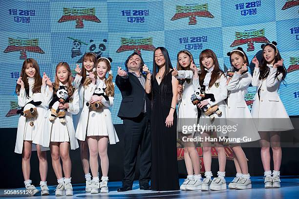 Actor Jack Black and director Jennifer Yuh pose for media with South Korean girl group Lovelyz during the premiere for 'Kung Fu Panda 3' on January...