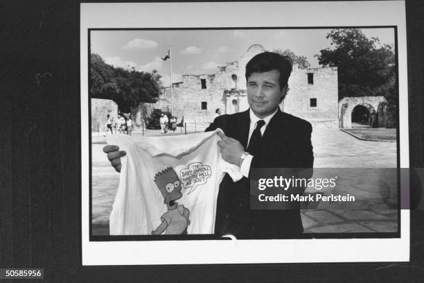 Cand. For TX State Rep. Barton Simpson holding up a Bart Simpson t-shirt, says he is less colorful than his namesake from The Simpsons TV series,...