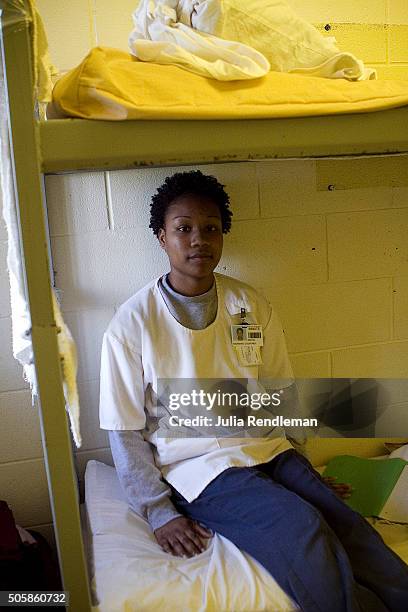 Courtney Andrews sits on her bunk in her dormitory October 25, 2010 at the Dwight Correctional Center in Dwight, Illinois. Andrews was returned to...