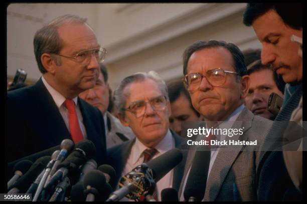 Congressional ldrs. Sen. Phil Gramm, Rep. Broomfield & Sen. Ted Stevens mobbed by press after WH mtg. W. Pres. Reagan.