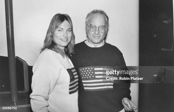 Actor Richard Dreyfuss & lupus-afflicted wife Jeramie wearing matching Ralph Lauren knitted sweaters w. American flags on them.
