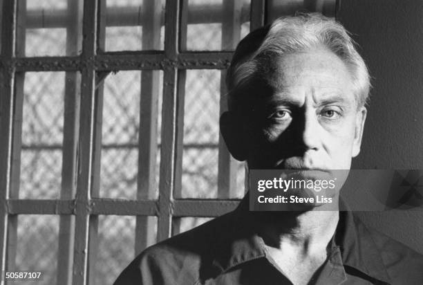 Murderer Dr. Jeffrey MacDonald posing in prison cell at Terminal Island federal penitentiary where he is serving 3 consecutive life terms for...