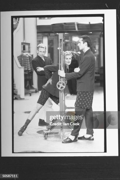 Fashion designer Jean-Paul Gaultier w. Models showing off his designs, incl. Male in double-breasted suit w. Long polka dot shorts worn over the...