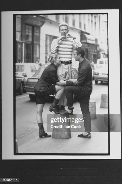 Fashion designer Jean-Paul Gaultier w. Models showing off his designs incl. Male in double-breasted suit w. Long polka dot shorts worn over the pants...