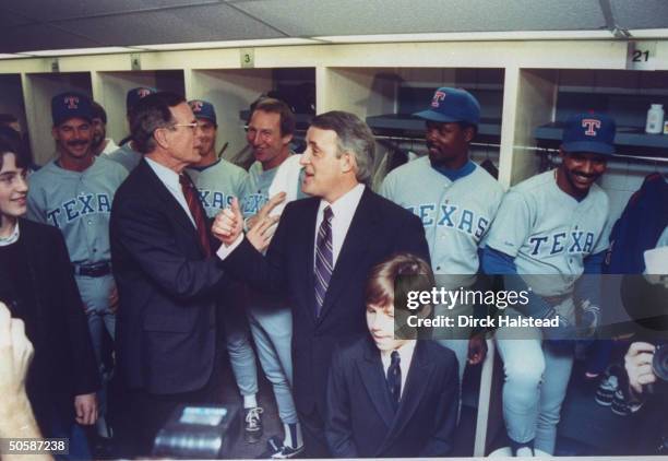 Pres. Bush & his host PM Brian Mulroney animatedly chatting up visiting TX Rangers team players, w. Mulroney's sons Benedict & Mark.; 1990.