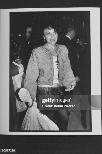 Fashion designer Diane Von Furstenburg, holding big white plasic bag, at 7th Ave on Sale AIDS benefit.