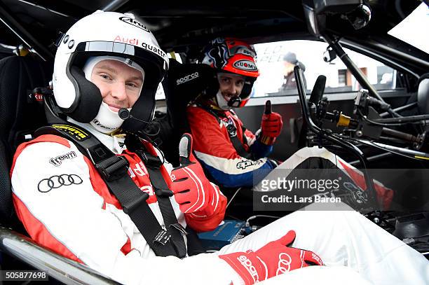 Andrea Dovizioso and Henrik Kristoffersen are seen during the final day of the Audi Quattro #SuperQ on January 20, 2016 in Kitzbuehel, Austria.