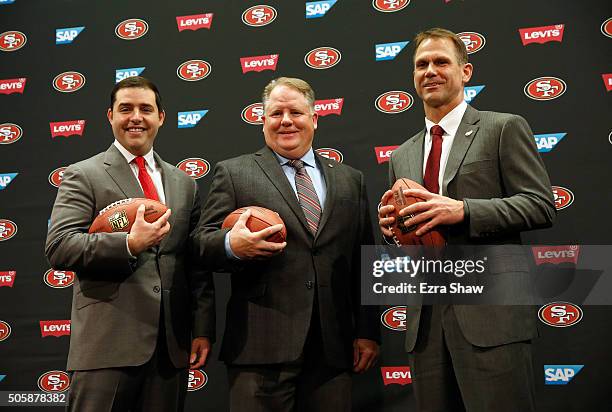 San Francisco 49ers CEO Jed York, Chip Kelly and San Francisco 49ers general manager Trent Baalke pose for a picture after a press conference where...