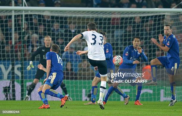 Tottenham Hotspur's Welsh defender Ben Davies has an unsuccessful shot during the English FA Cup third round replay football match between Leicester...