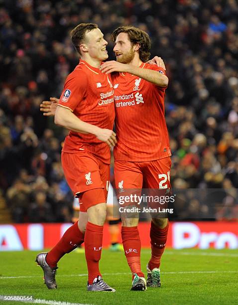 Joe Allen of Liverpool celebrates his goal with Brad Smith of Liverpool during The Emirates FA Cup Third Round Replay between Liverpool and Exeter...