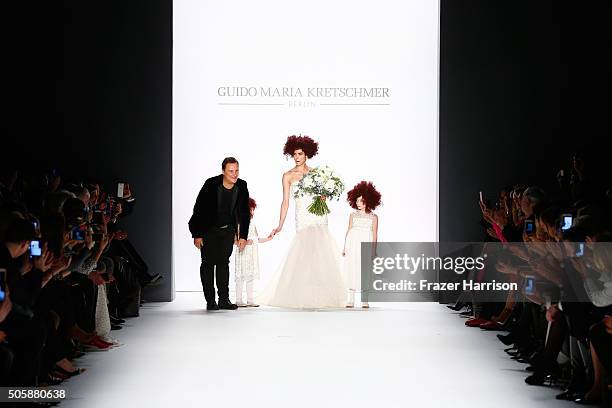 Guido Maria Kretschmer and Zoe Helali walks the runway at the Guido Maria Kretschmer show during the Mercedes-Benz Fashion Week Berlin Autumn/Winter...