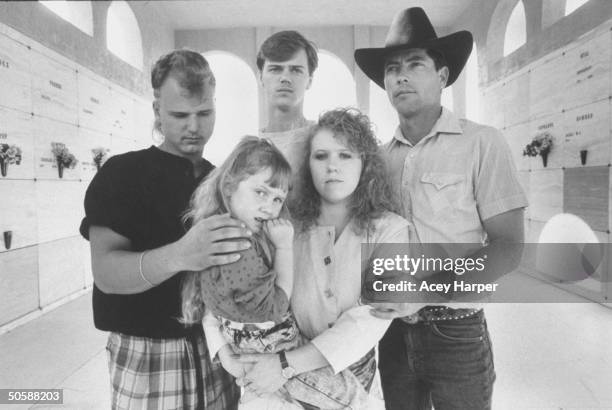 Murder victim Peggy Carr's family incl. Daughter Gelena, granddaughter Kacy posing w. Sons, Duane & Allen & son-in-law Gary Shiver as they stand...