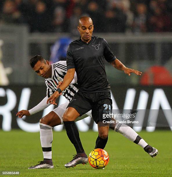 Abdoulay Konko of SS Lazio competes for the ball with Alex Sandro of Juventus FC during the TIM Cup match between SS Lazio and Juventus FC at Stadio...