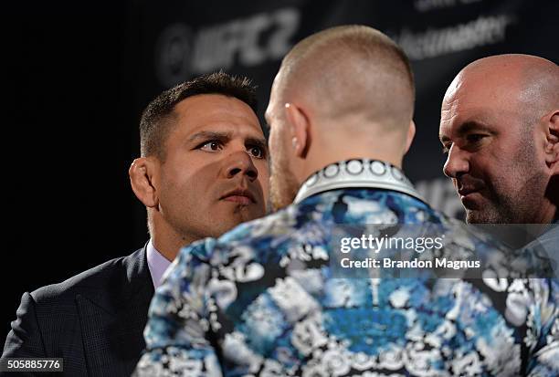 Lightweight champion Rafael dos Anjos and UFC featherweight champion Conor McGregor face off during the UFC 197 on-sale press conference event inside...