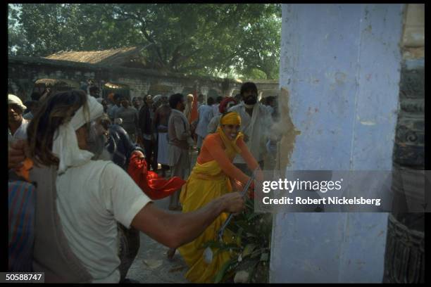 Militant Hindu activists on rampage, rioting, re razing Muslim mosque, Babri Masjid, & erecting Hindu temple to god-king Rama.