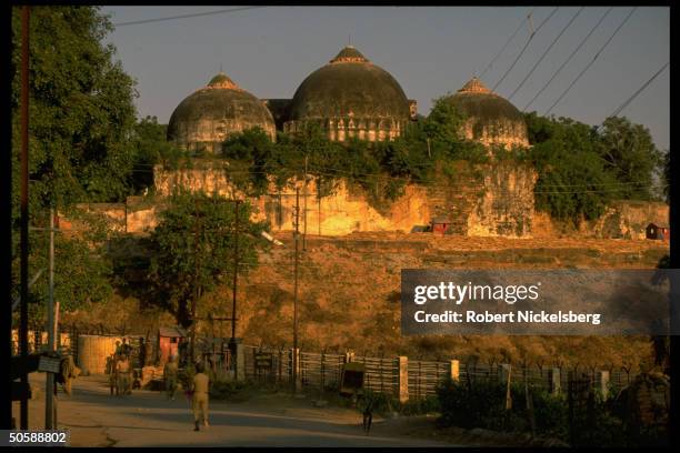 Police guarding fortified post by Babri Masjid against rioting Hindus bent on razing mosque & erecting Hindu temple to god-king Rama.