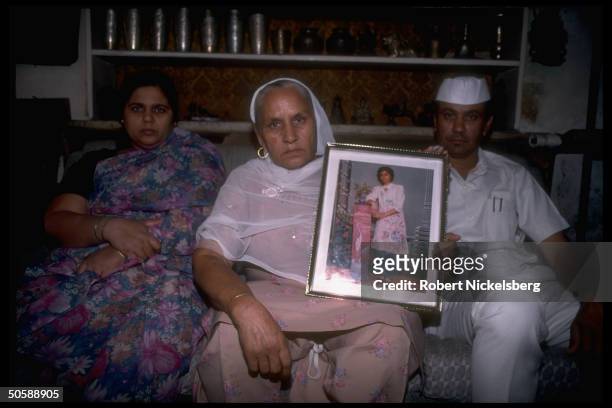 Family with picture of Monica Chadha a higher caste student who self-immolated in protest of Mandal Committee plan for government job quotas for...