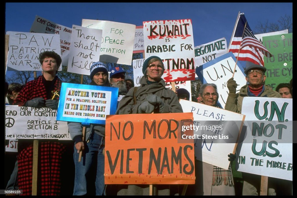 Random Crowd Signs Crowd w. signs & flags protesting against US military intervention in ...