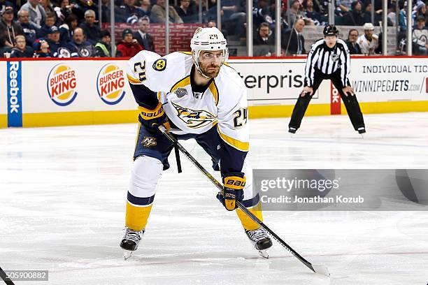 Eric Nystrom of the Nashville Predators gets set for a first period face-off against the Winnipeg Jets at the MTS Centre on January 14, 2016 in...