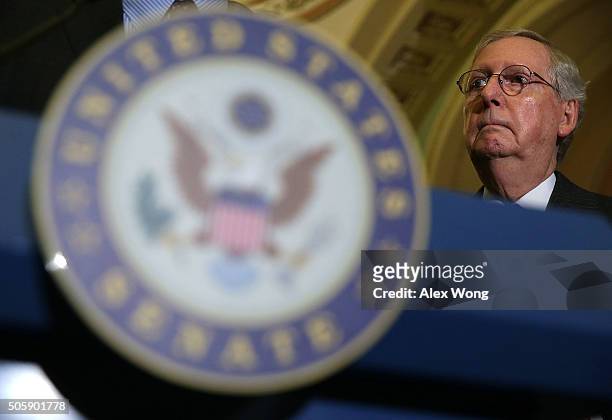 Senate Majority Leader Mitch McConnell listens during a media briefing after the Republican weekly policy luncheon January 20, 2016 on Capitol Hill...