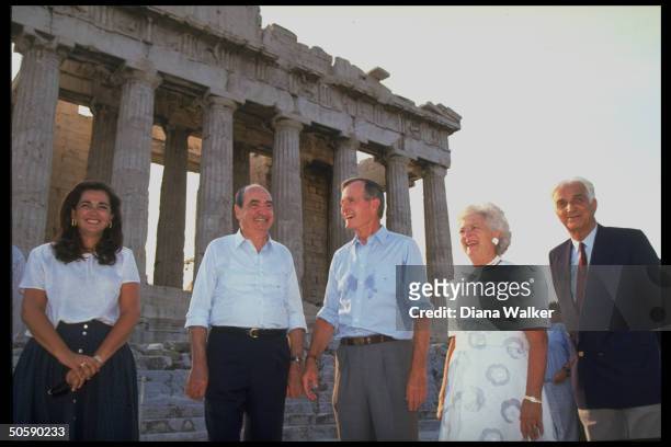 Pres. & Barbara Bush w. PM Mitsotakis & daughter Dep. Min. Dora Bakoyianni & museum curator Prof. Kalligas, by Parthenon, touring Acropolis.
